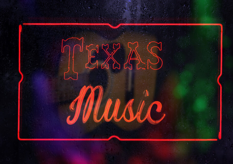 Neon Texas Music Sign in Rainy Wet Window